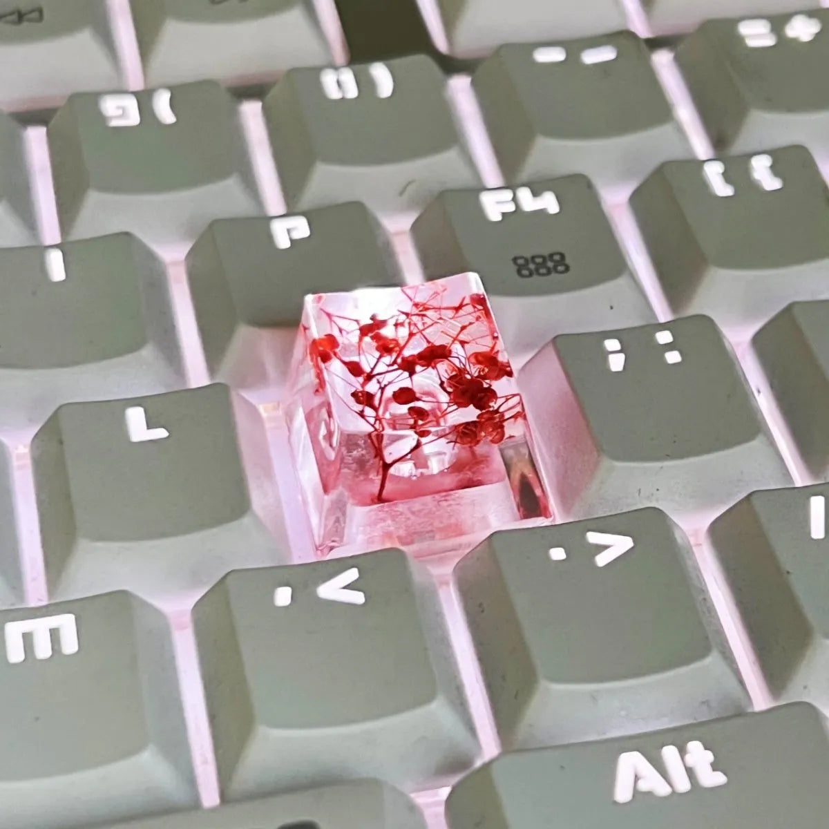 Transparent resin mechanical keyboard keycap showing starry sky galaxy design in multiple colour options
