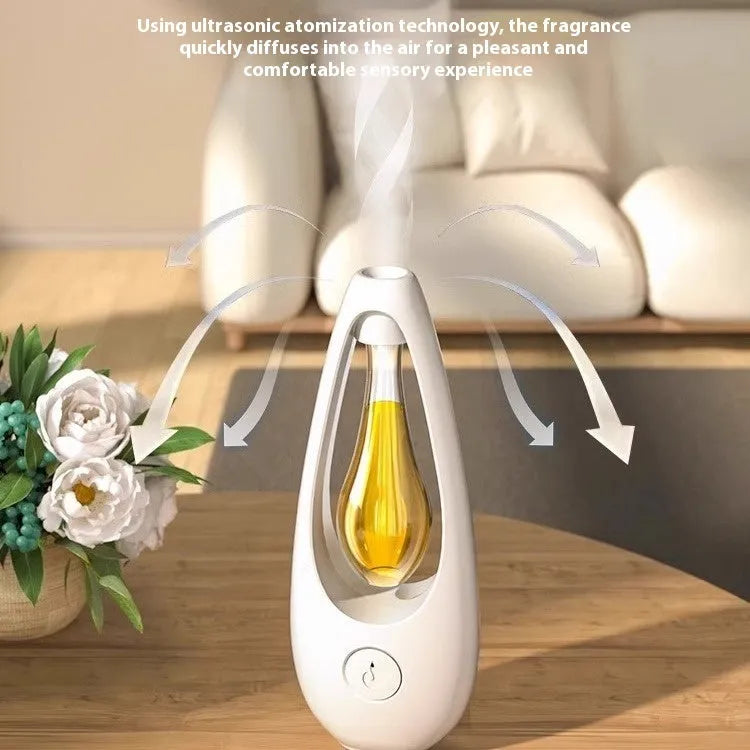 Ultrasonic aroma diffuser with mosquito repellent in a compact plastic design on a table, with essential oil bottle beside it