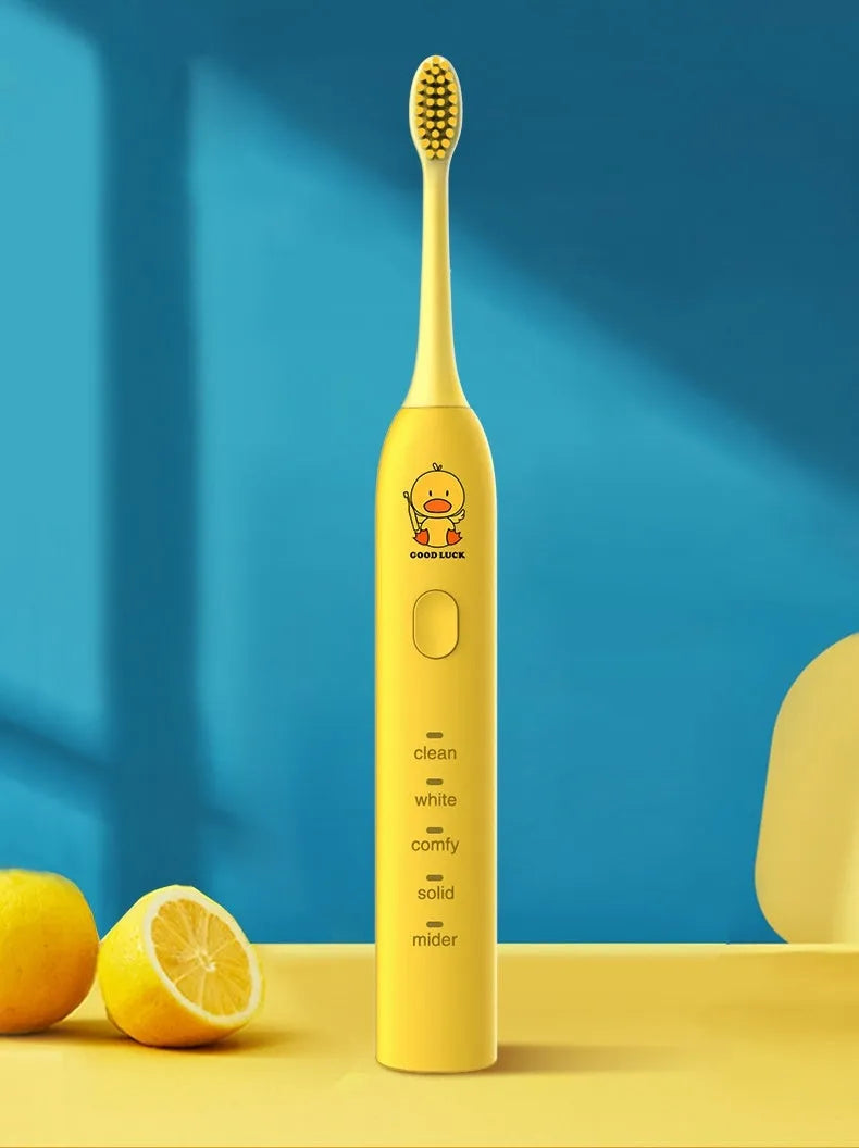 Yellow USB rechargeable electric toothbrush with soft bristles and duck laser engraving design