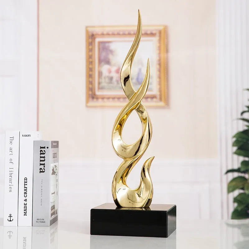 Resin high-rise festival decoration craft in bright gold colour with modern simple design