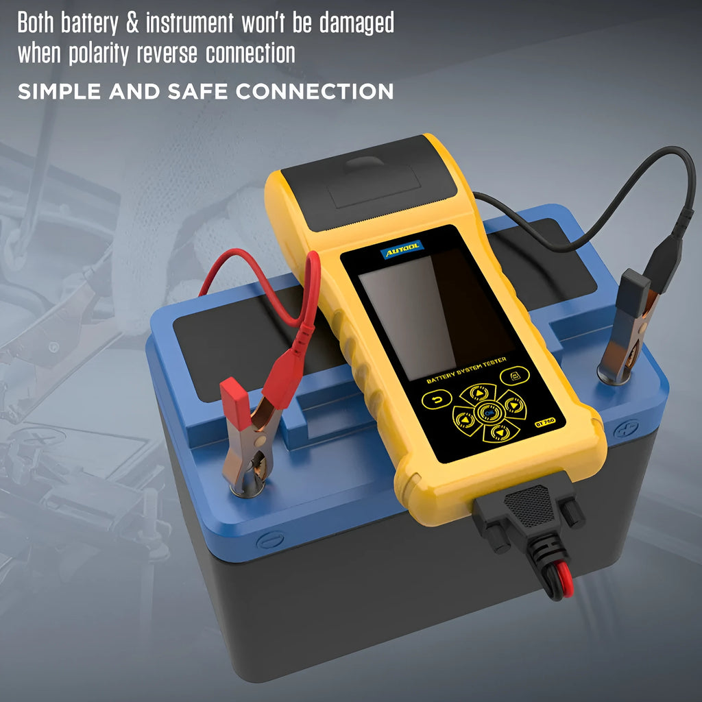 Autool BT760 car battery tester with colour screen and attached battery clips on a workbench