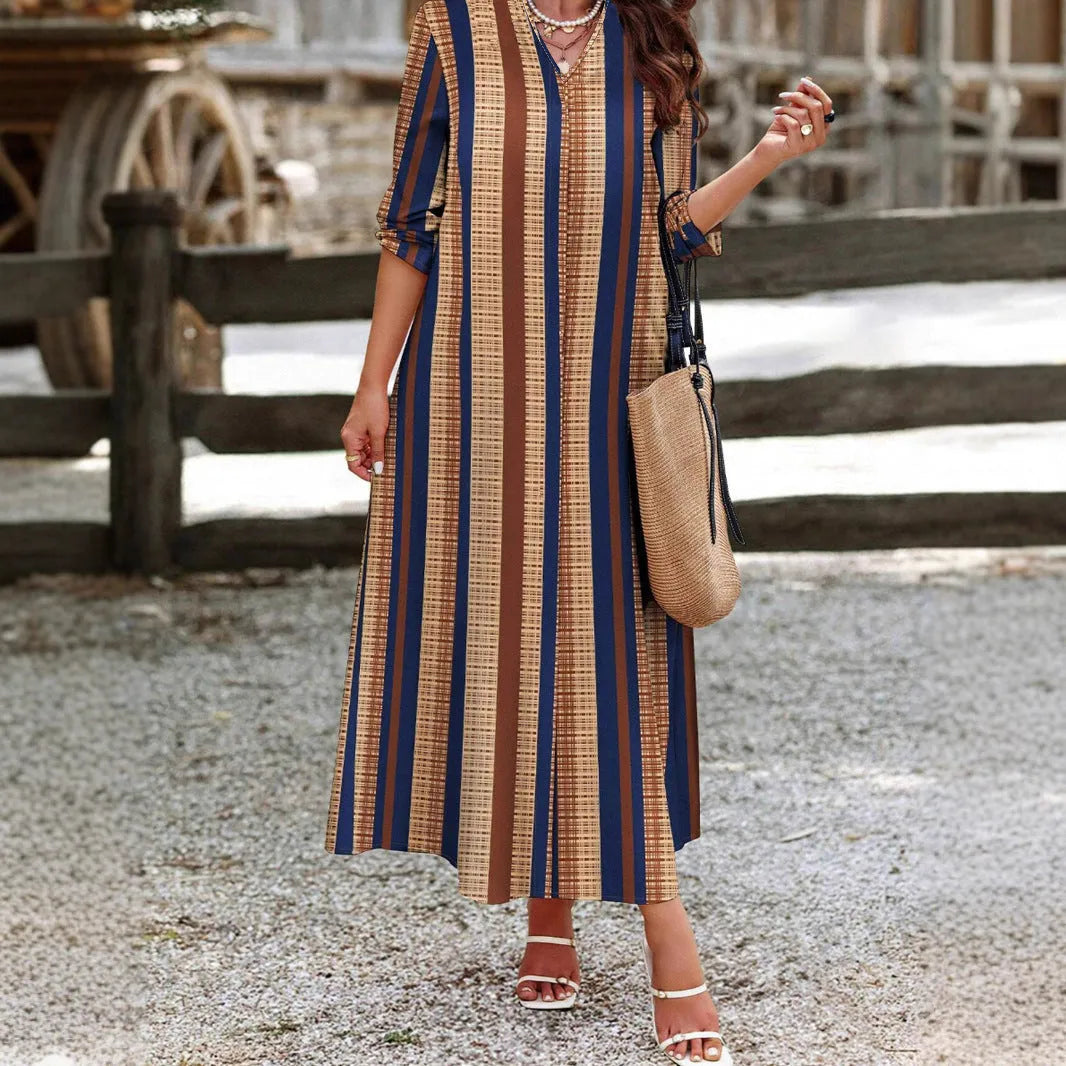Camel coloured vertical striped V-neck long dress with A-line silhouette and long sleeves