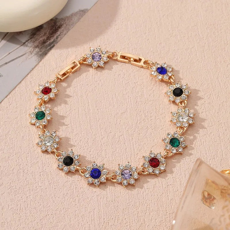 Flower-shaped electroplated bracelet in zinc alloy with colourful crystal accents