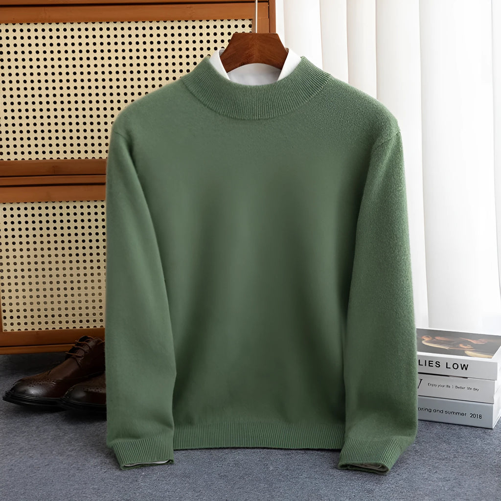 Man wearing a loose-fit half-collar wool sweater in a neutral colour, showing the knit texture and regular sleeve design.