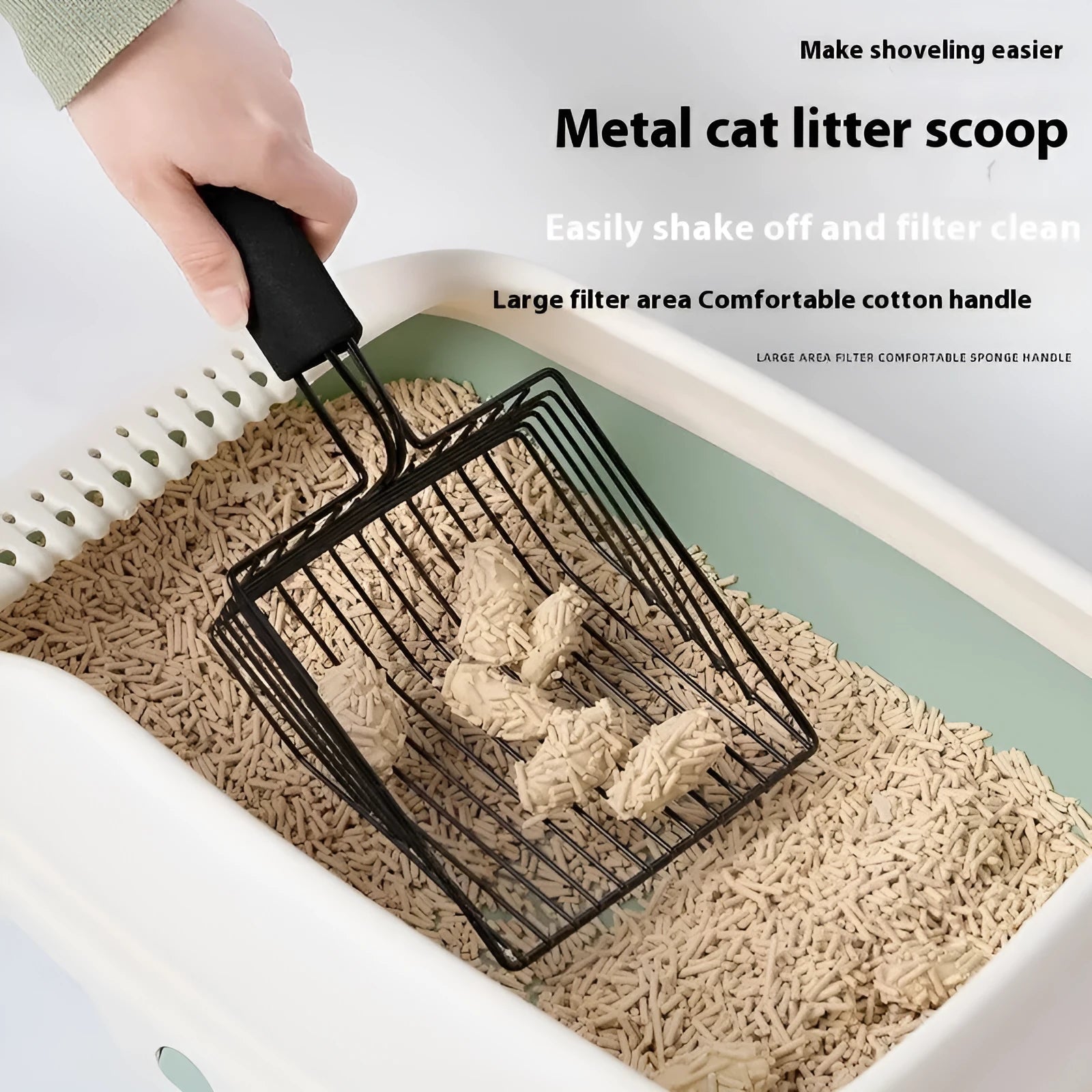 Black alloy metal cat litter scoop showing 0.8cm gap spacing between tines