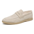 Men's leather slip-on casual shoes in black with round toe and mid heel