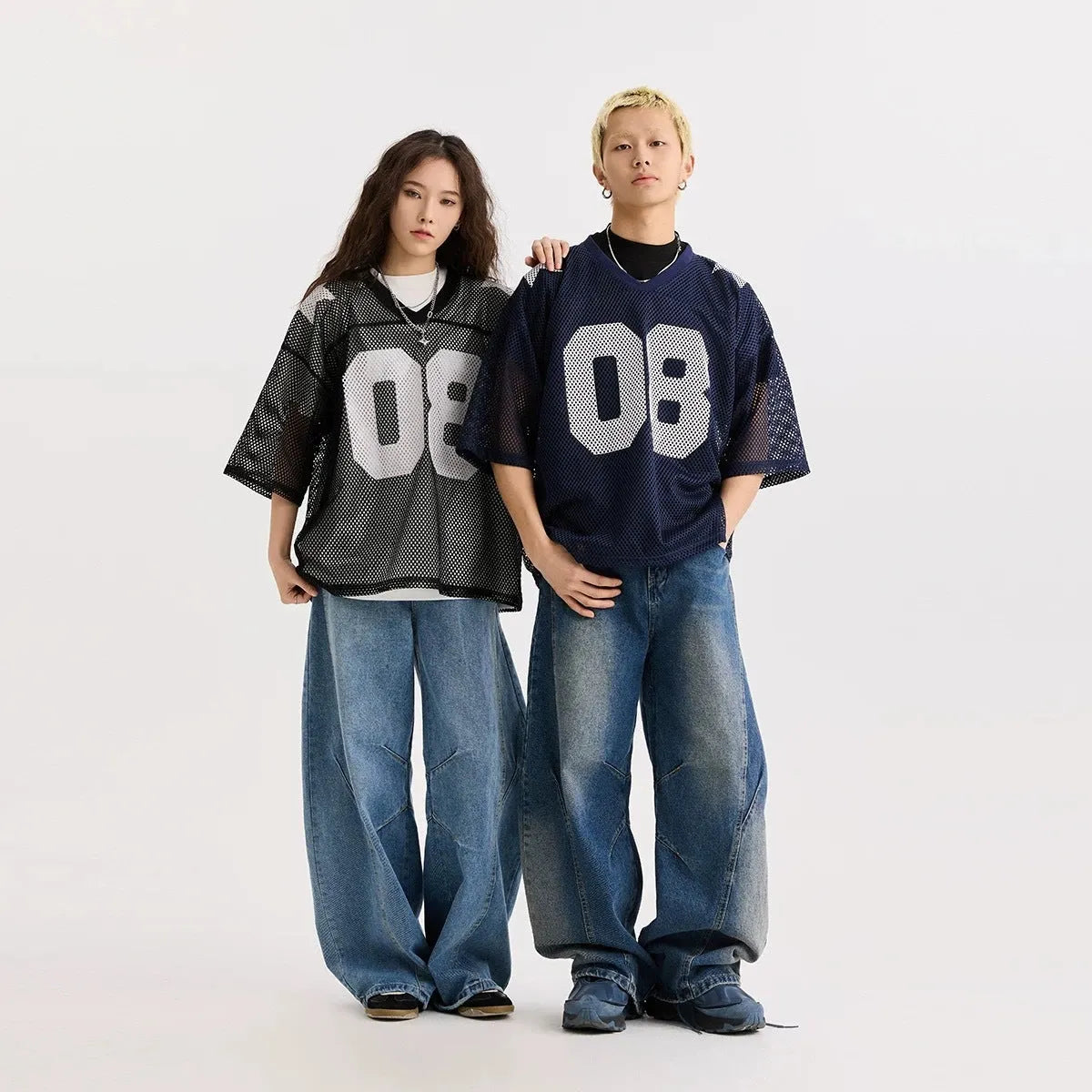 Black loose fit pullover shirt with white letter print and half sleeves