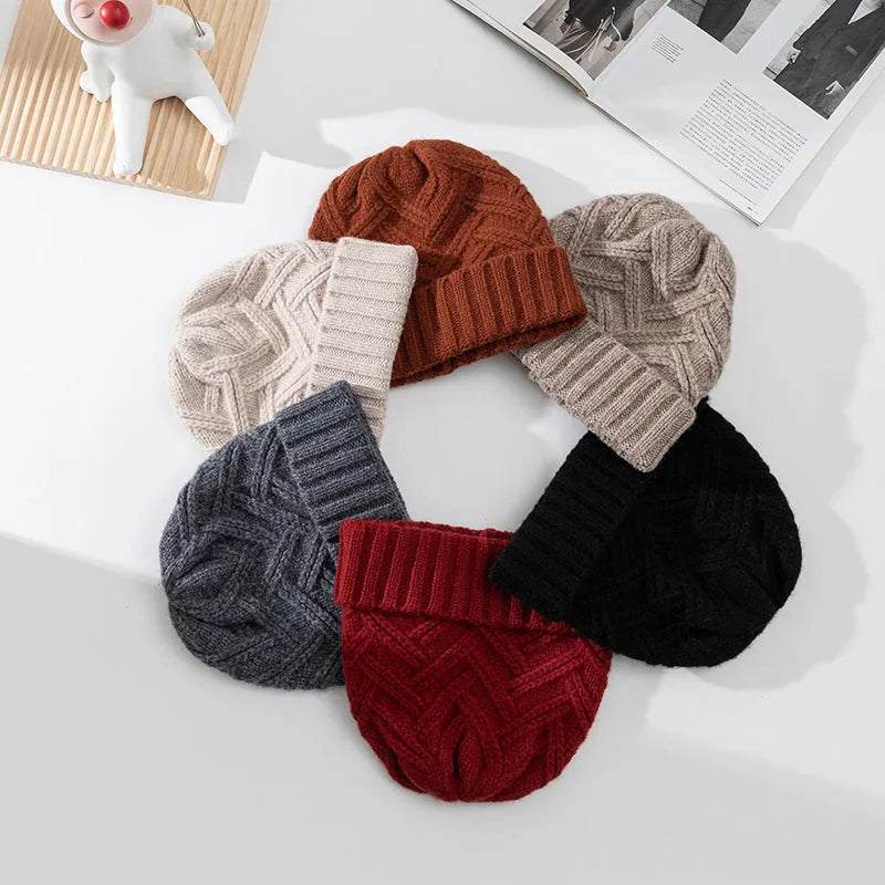 Women's knitted wool dome hat in one of six colours: ivory white, khaki, red, brown, gray, or black.