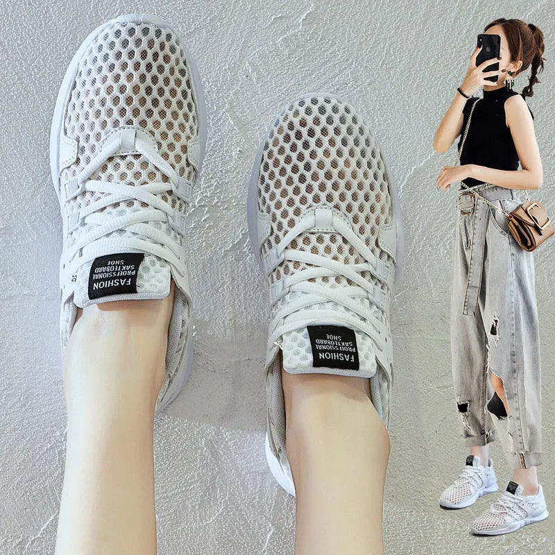 Low-top casual sneaker with hollow breathable mesh upper and round toe in a white net colour variant.