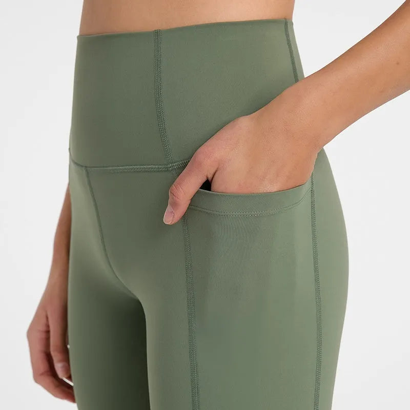 Women's tight black stretch sports shorts with cotton blend lining for running and fitness.