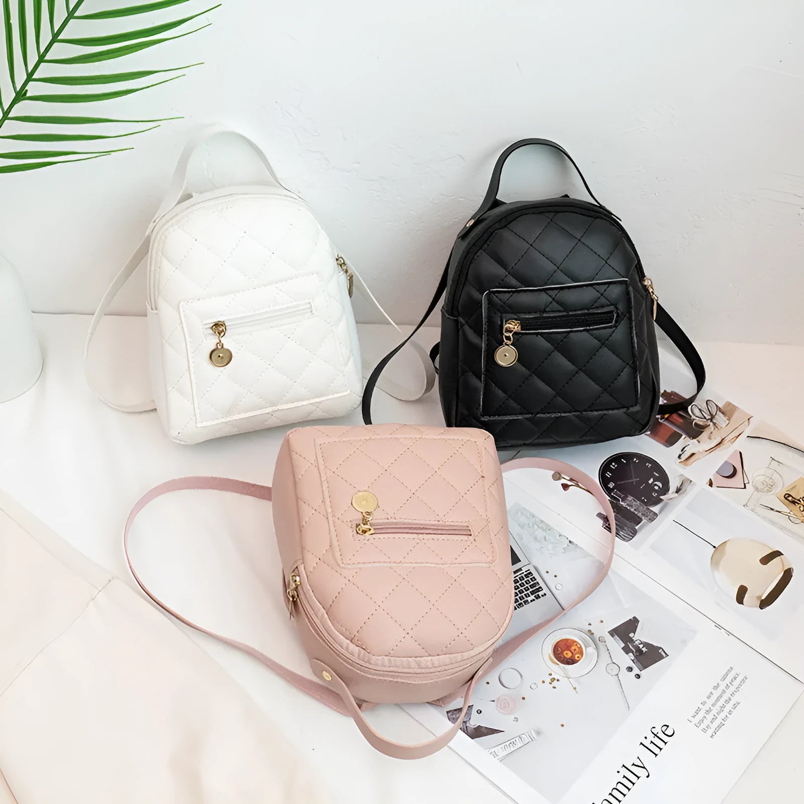 Korean style girls' embroidered PU backpack in white with hard shell construction and sandwich pocket