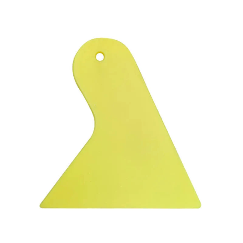 Car scratch repair kit with polishing wax, sandpaper, sponge, cloth, scraper, and brush on workbench