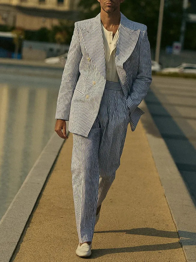 Blue and white striped polyester suit set showing blazer and matching trousers for formal wear