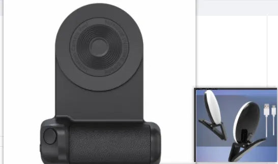 Black 3-in-1 magnetic phone camera holder with ergonomic handle on a wooden table.