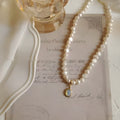 Adjustable French Court Vintage Pearl necklace with geometric pendant on metallic chain