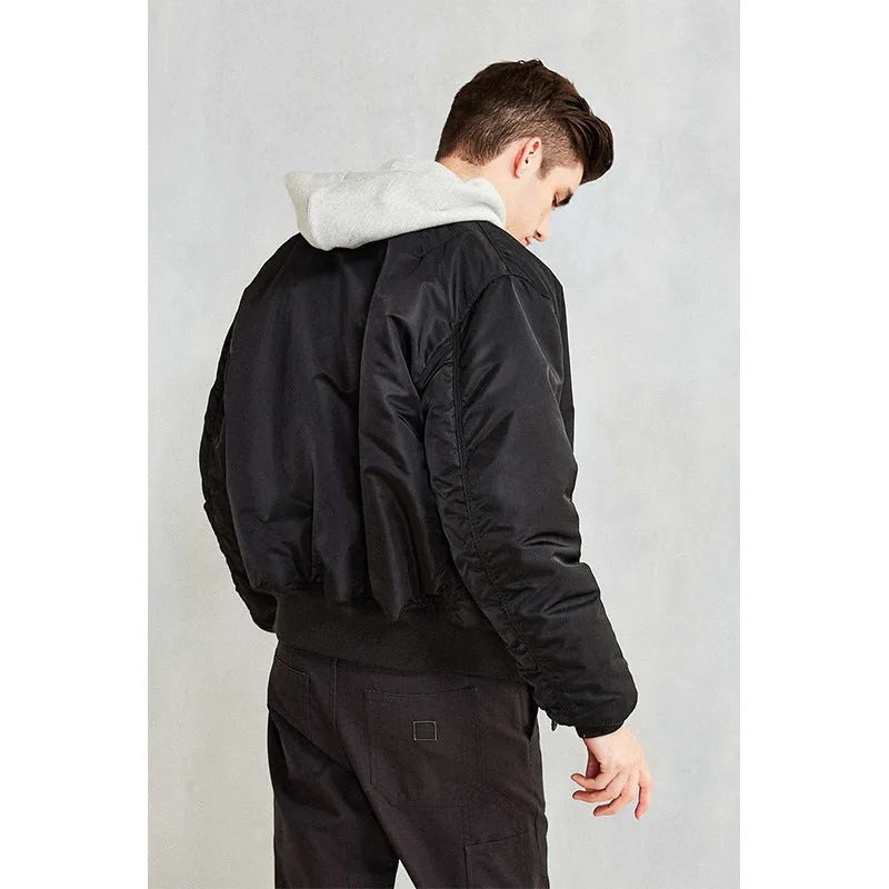 Men's Army Green loose fit cotton-padded pilot jacket with workwear styling on a hanger.