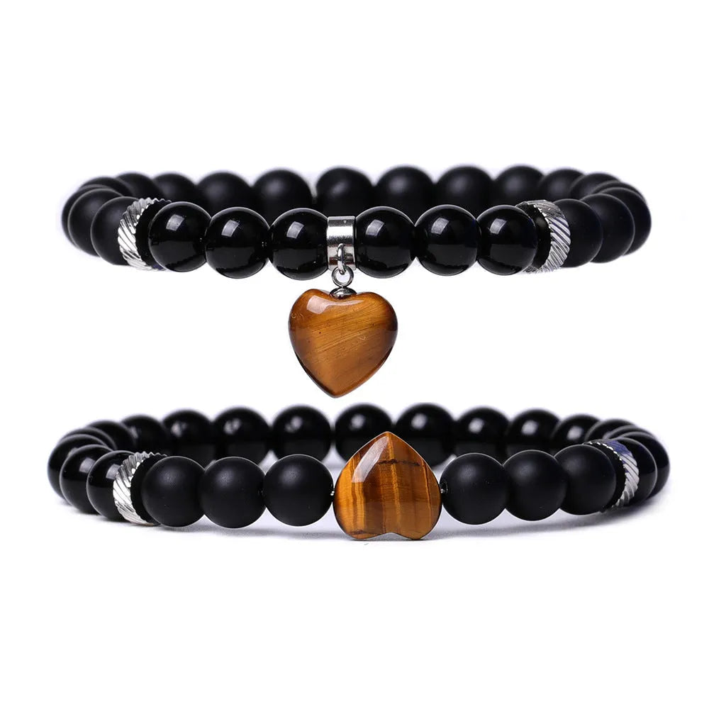 Set of two polished natural stone heart-shaped bracelets for couples in matching colour
