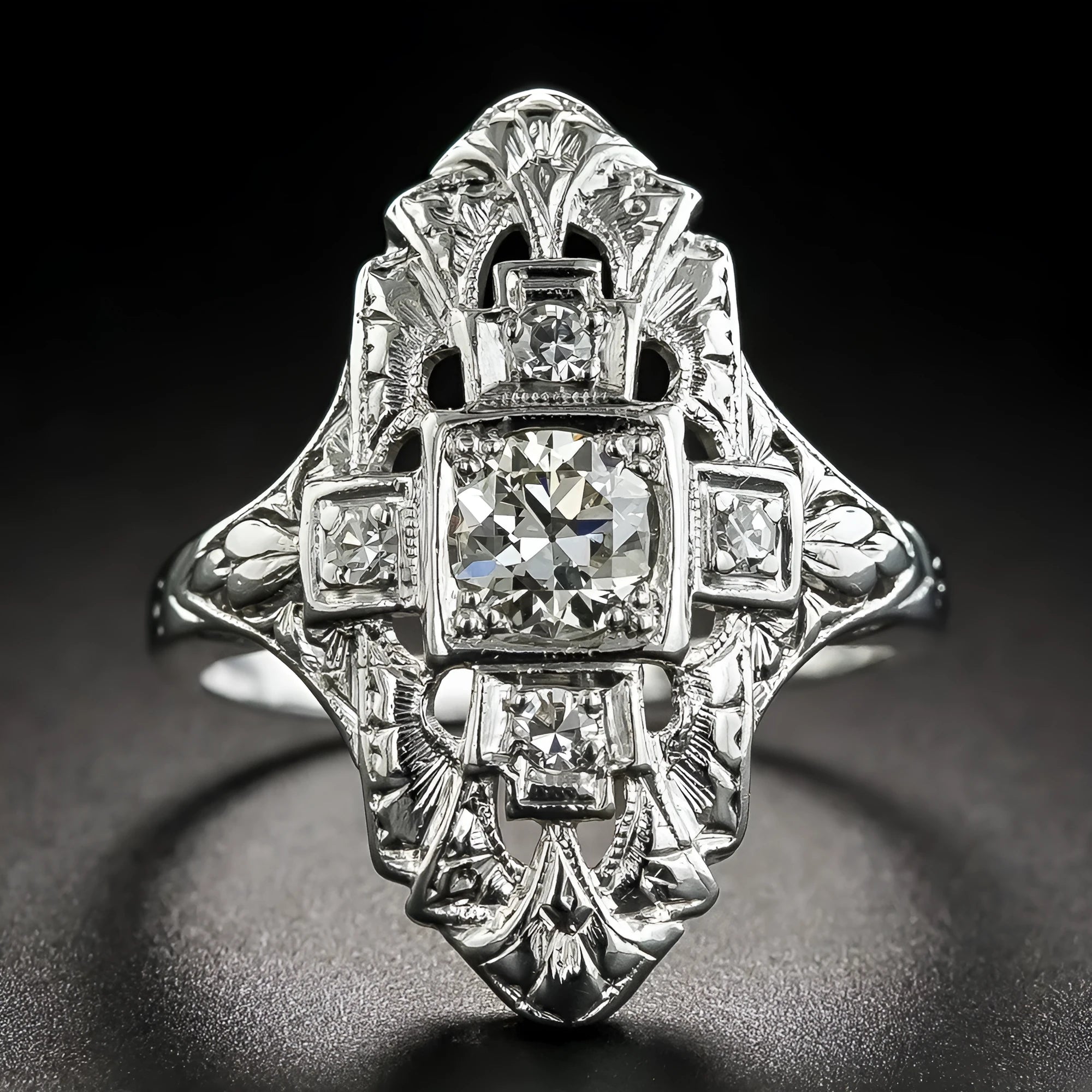 Geometric hollow-out copper ring with silver electroplated finish and diamond stud accents