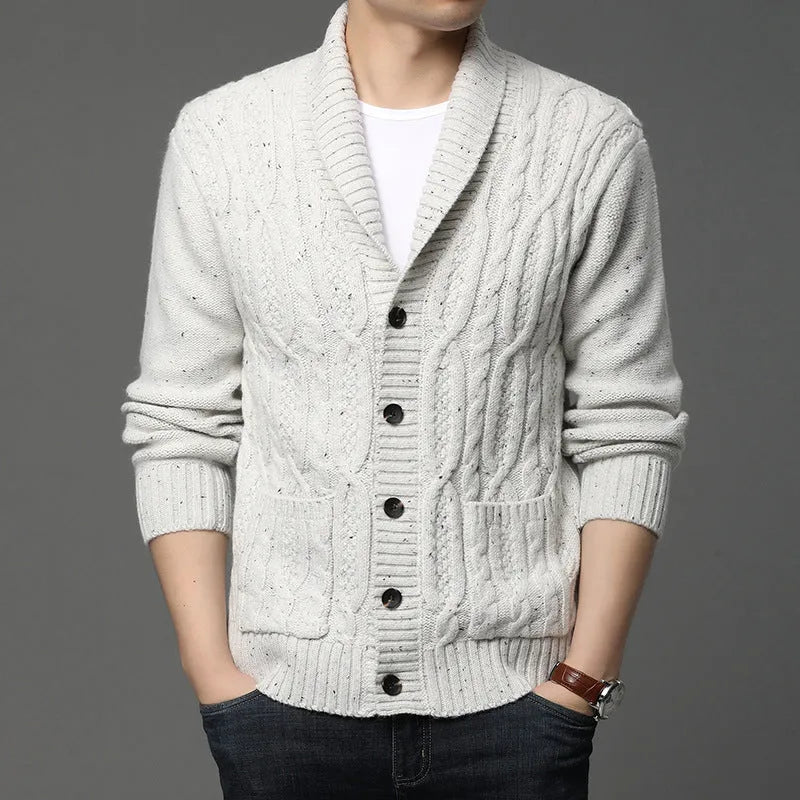 Men's Korean style jacquard patterned knit cardigan jacket on a hanger showing straight fit and textured fabric.
