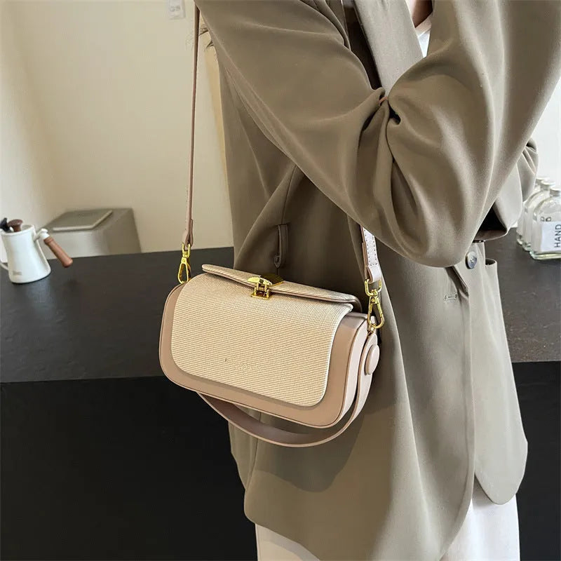 Women's PU leather messenger bag in horizontal square shape with contrast colour stitching and lock closure, available in multiple colours