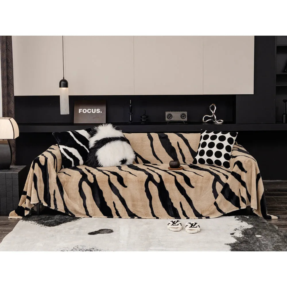 Zebra pattern flannel sofa cover with non-slip backing in caramel colour