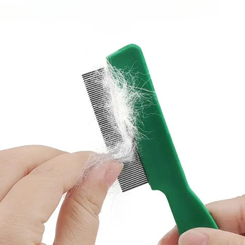 Green plastic handle stainless steel pet flea comb for dogs and cats on white background
