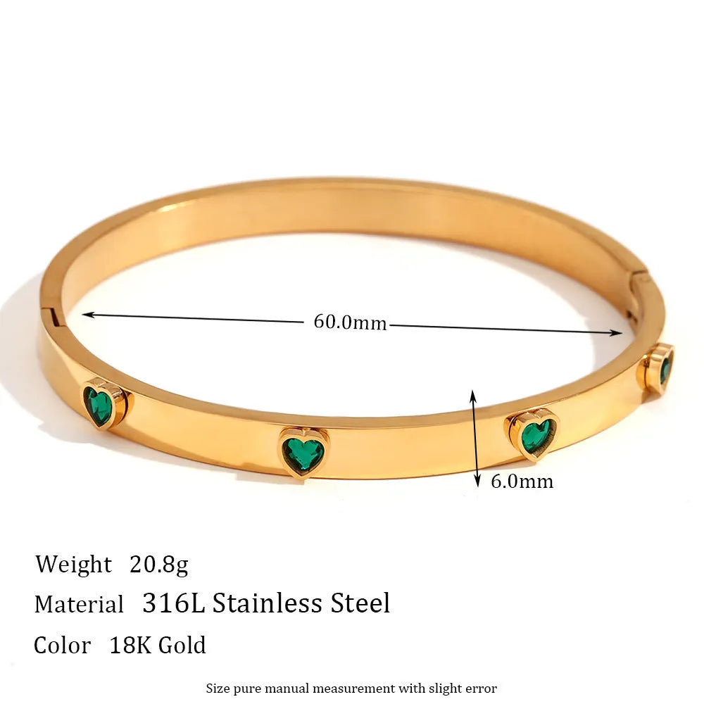 Stainless steel bracelet with peach heart centrepiece and micro-inlaid detailing in golden finish
