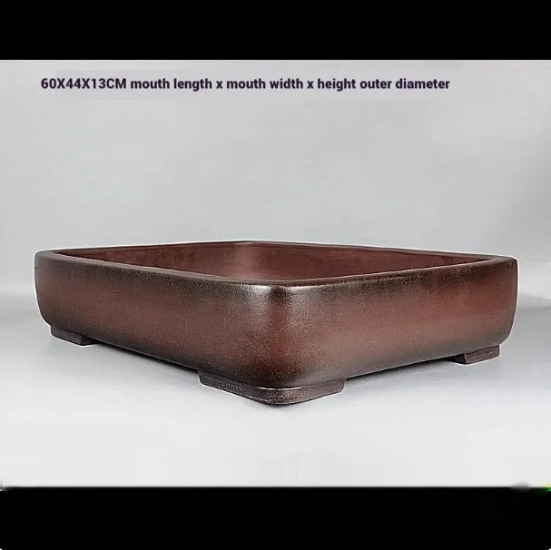 Handmade antique rectangular purple clay flower pot showing traditional finish and substantial size.