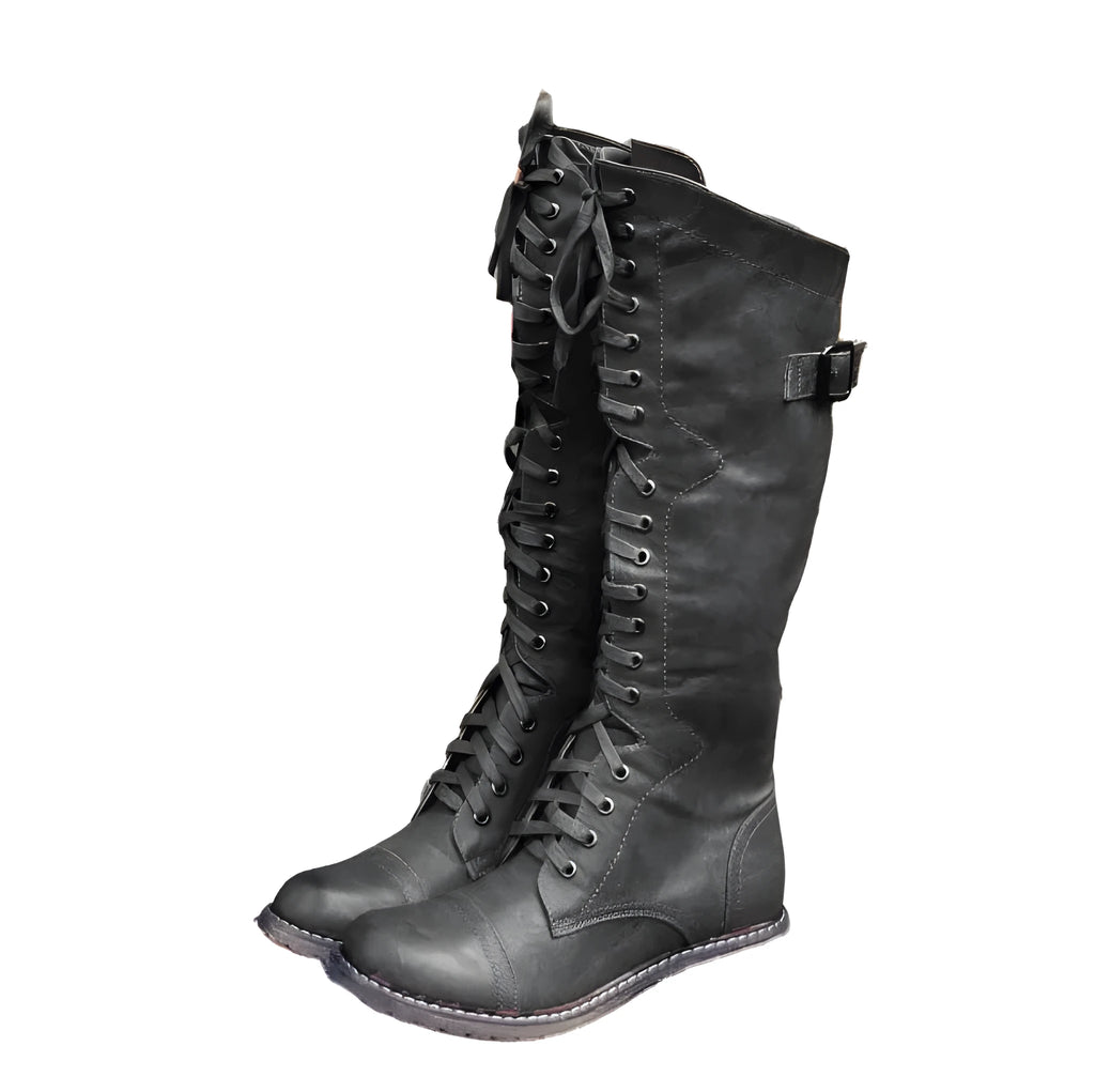 Women's black artificial PU knight boots with cross strap and lace-up closure on a size label.