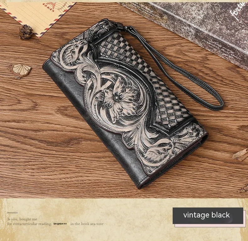 Brown genuine leather women's tri-fold wallet with embossed floral pattern showing interior compartments