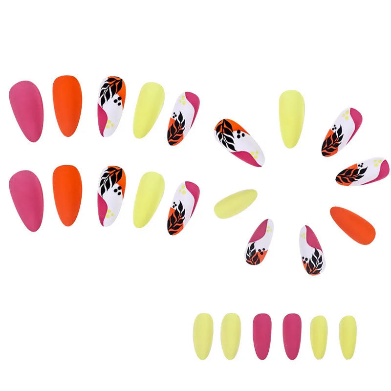 Four boxes of Wear Armour medium almond frosted nail stickers showing French leaf, plating, macaron, and leopard print designs.