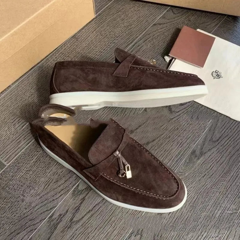 Pair of high-top gommino slip-on loafers in a choice of colours with round toe and rubber sole.