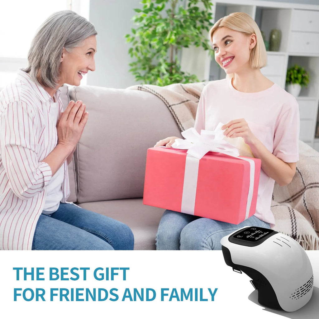 Electric knee massager with intelligent kneading and heating, white colour, USB rechargeable, placed on a sofa