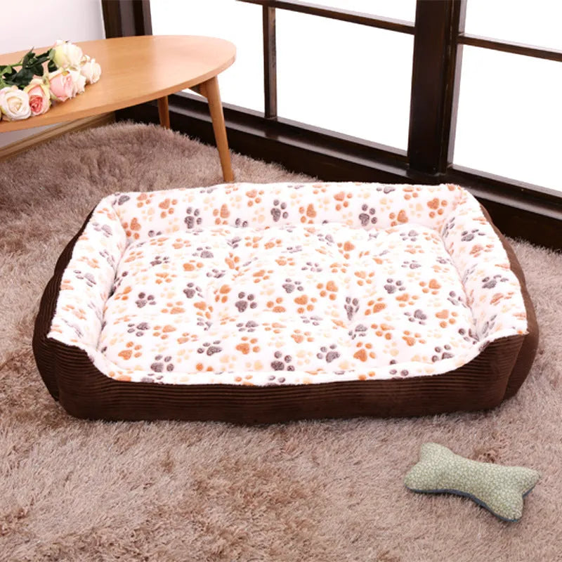 Plush sofa-style dog bed with raised sides in beige colour for small dogs