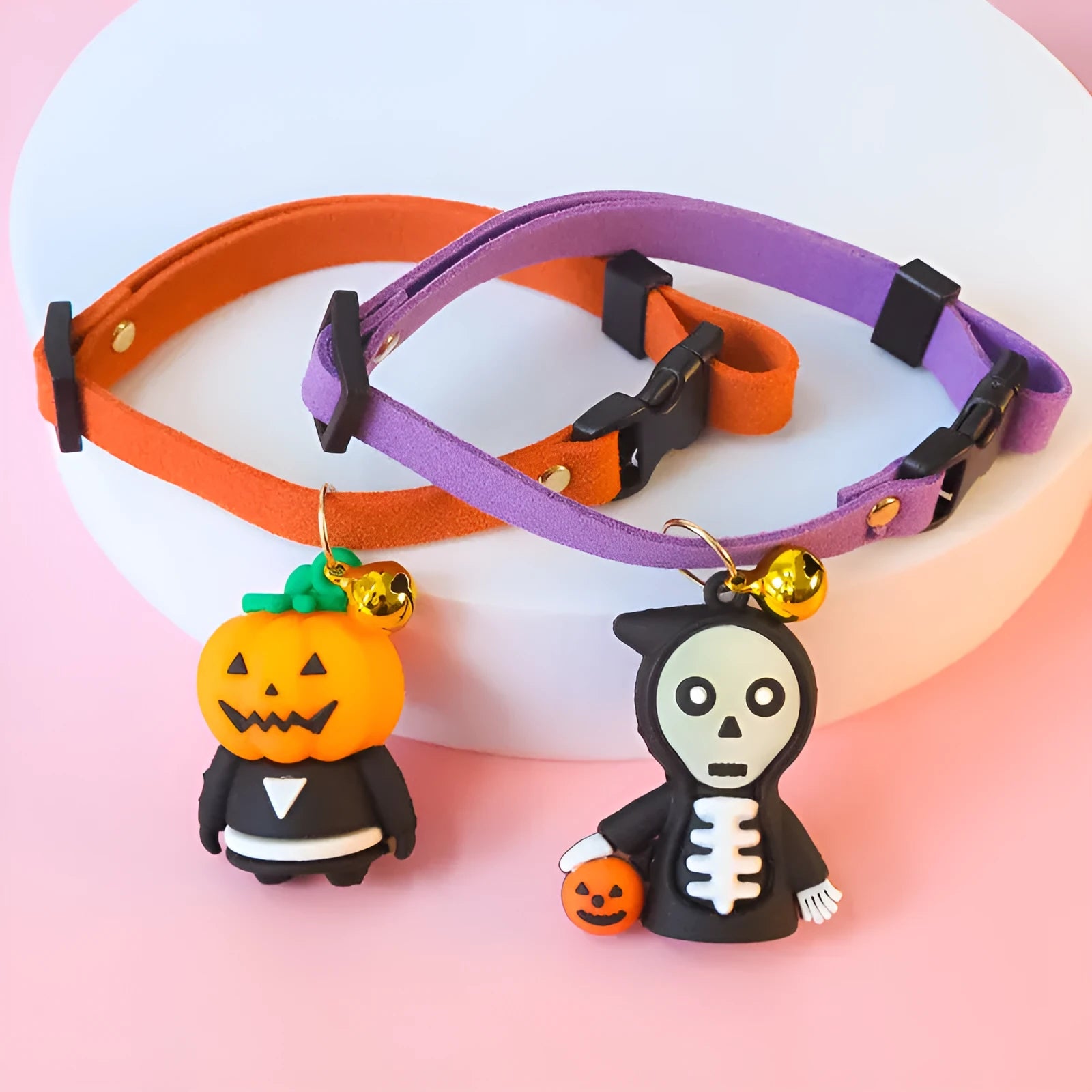 Halloween pet collar decoration showing pumpkin man, luminous brat, and luminous skull designs with sizing options