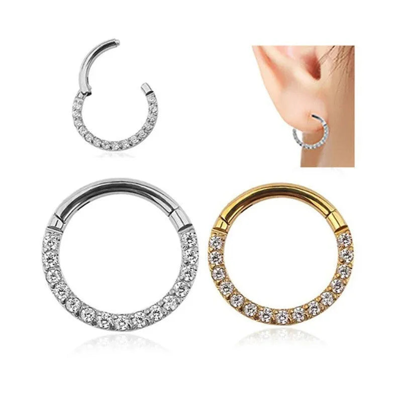 A round, seamless nose ring made of stainless steel, shown in various electroplated colour finishes including gold, rose gold, and black.