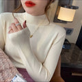 Slim fit viscose knitted top in mild blue colour with long sleeves on hanger