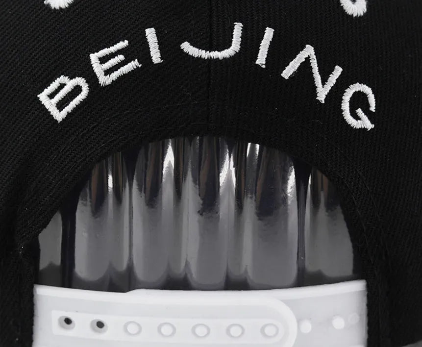 Adjustable cotton baseball cap with letter embroidery in black or white colours