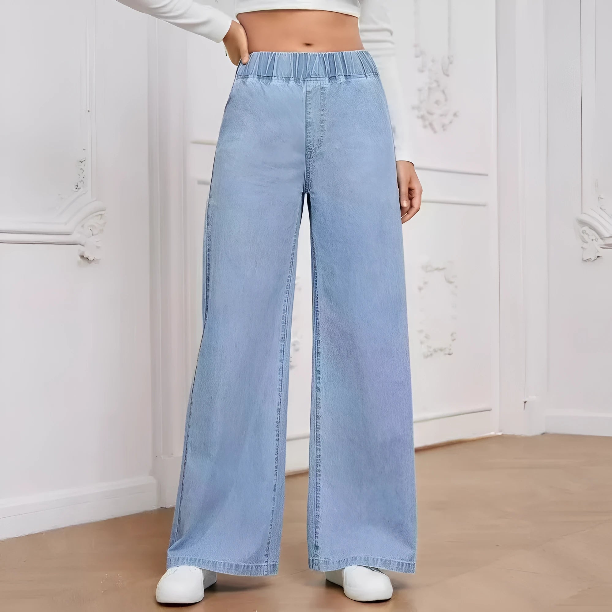 Light blue washed wide-leg jeans showing straight cut and mid waist design