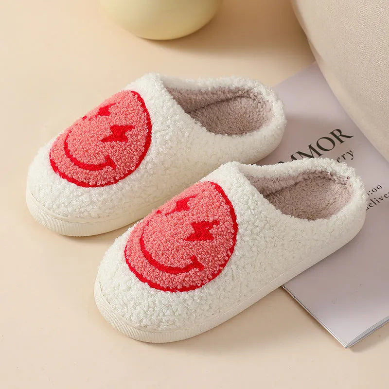Women's plush cartoon love style home slippers with a round toe and non-slip PVC sole.