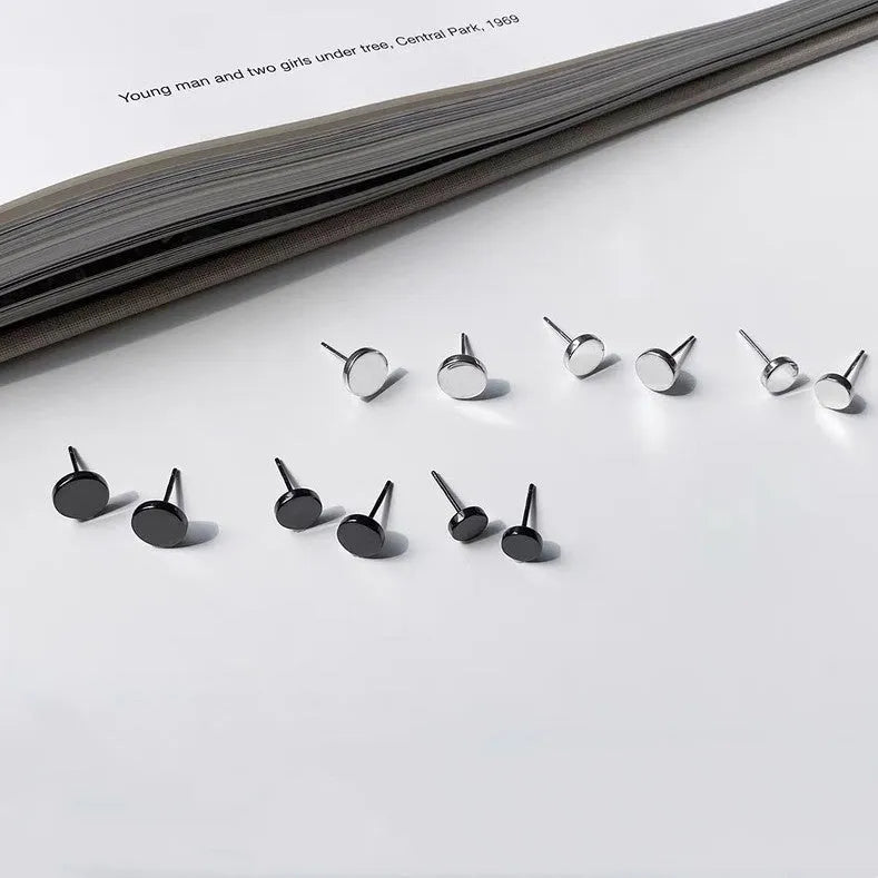 S999 sterling silver ear bone studs in silver and black colours with round geometric shape