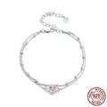 Sweet girlish sterling silver bracelet with a small heart-shaped pendant on an adjustable chain.