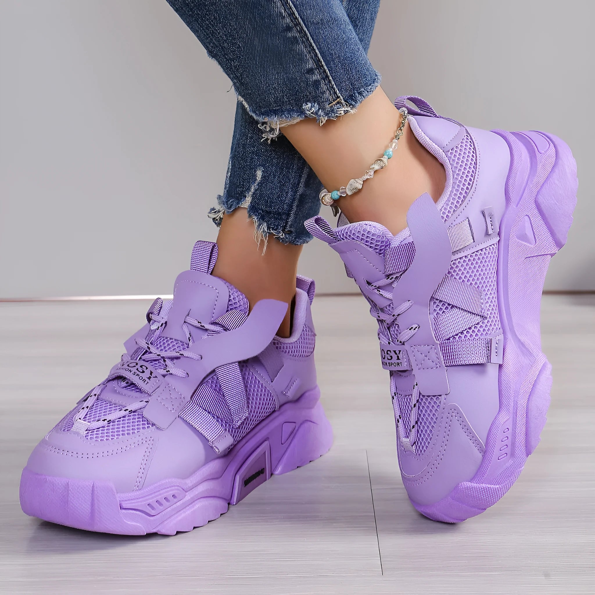 Women's platform sports sneakers in multiple colours with mesh upper and lace-up front.