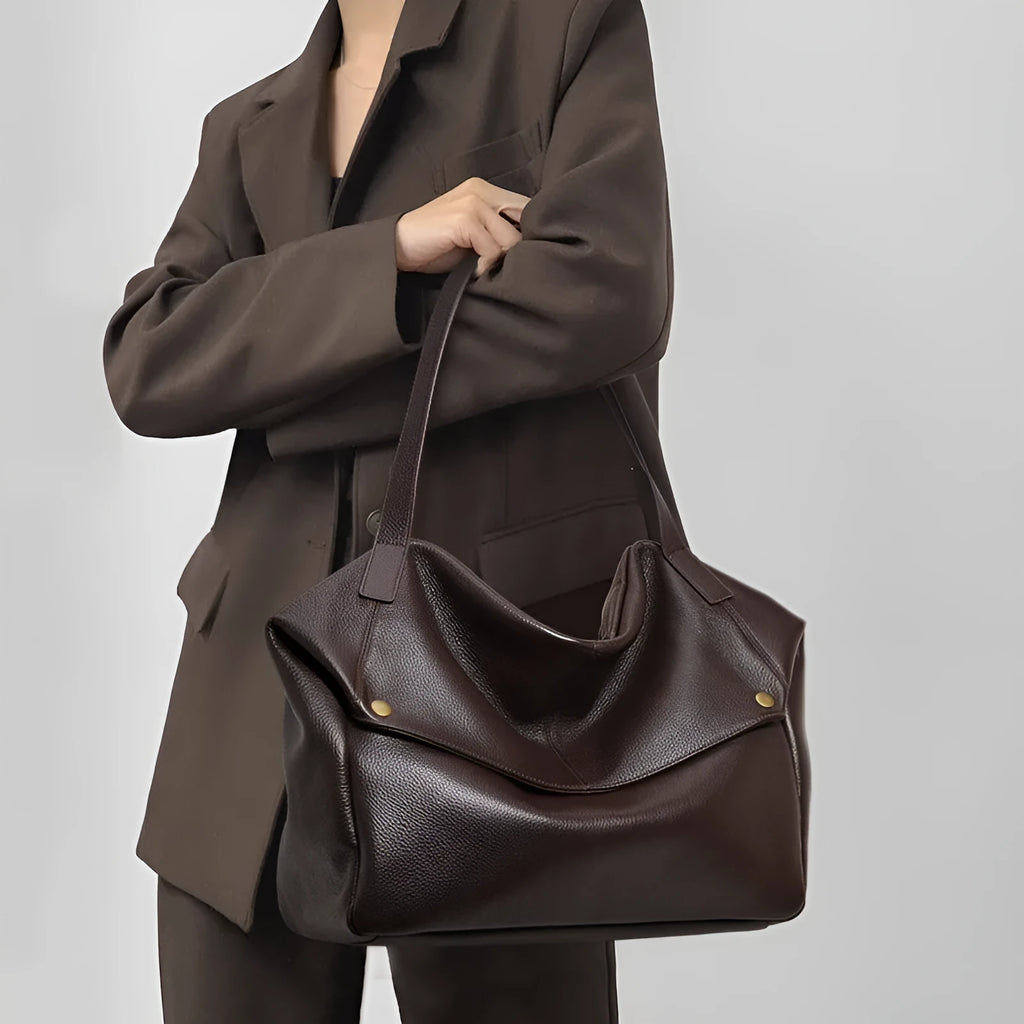 Brown genuine leather women's shoulder bag with horizontal square shape and interior zippered pocket