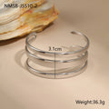 A simple open geometric stainless steel bracelet for women, shown in a gold tone finish.