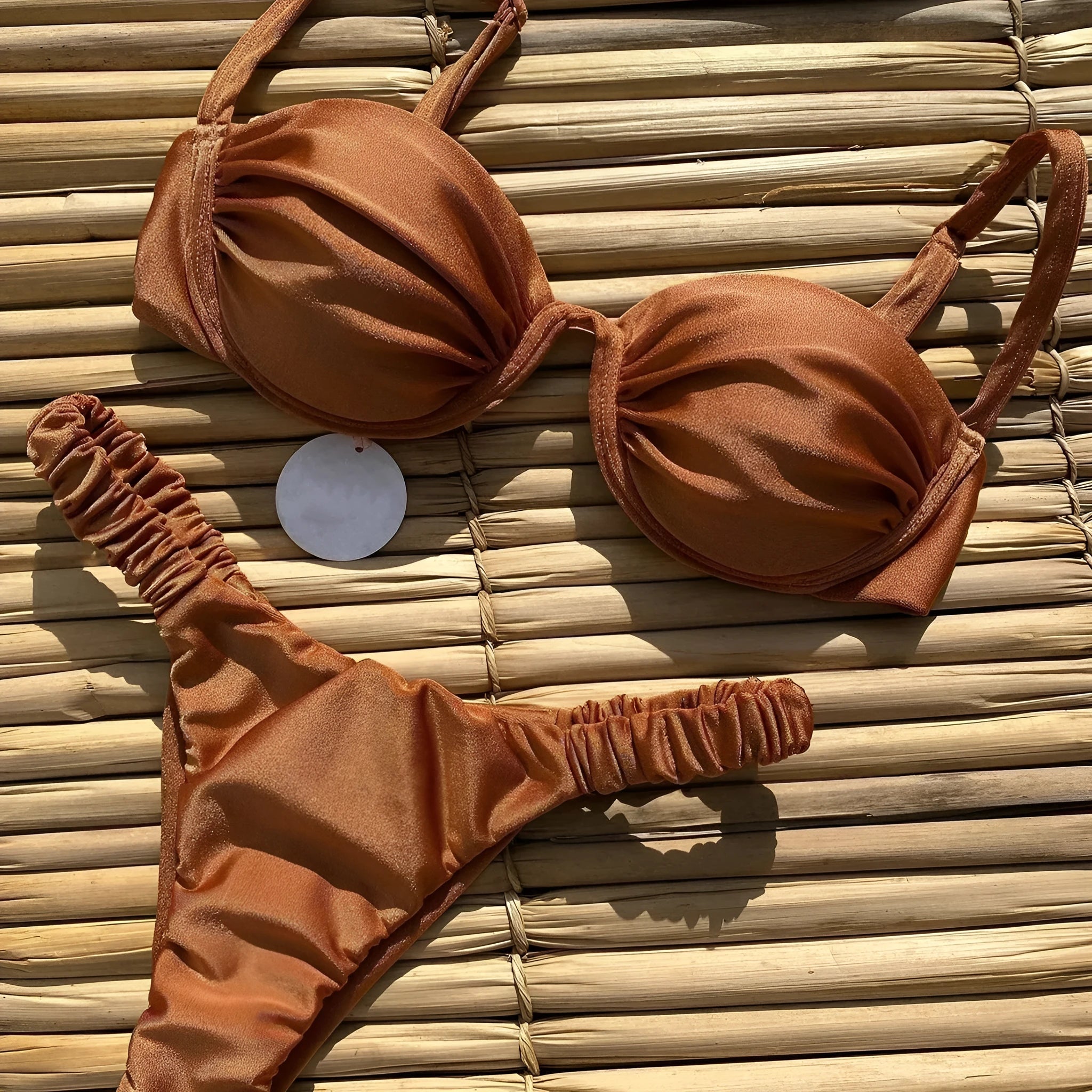 Women's black underwire bikini swimsuit with brief bottoms on a mannequin.