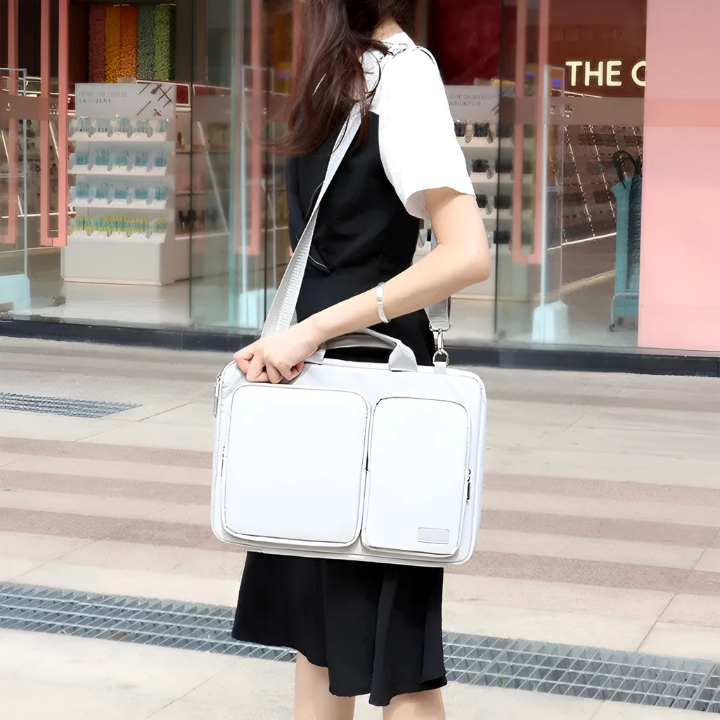 Shock proof polyester shoulder laptop bag in black with retractable handle and zipper opening
