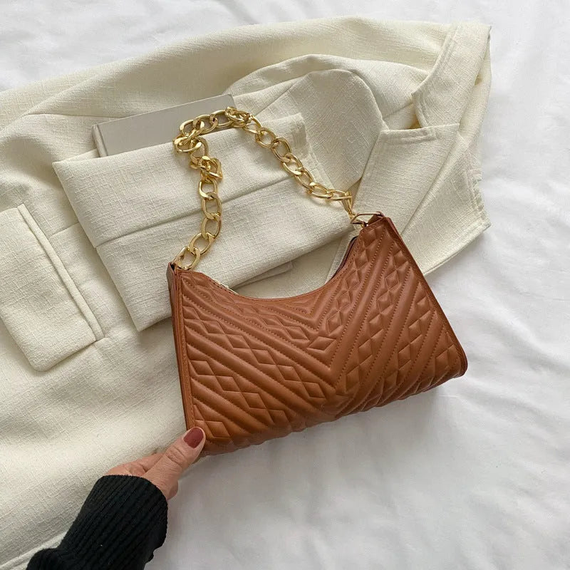 Pleated chain strap baguette shoulder bag in vertical square shape with soft PU leather exterior
