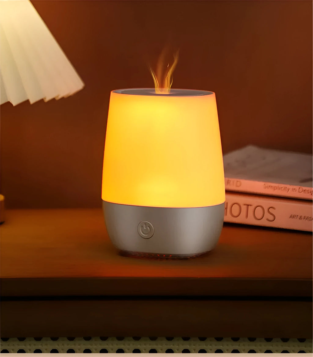 White USB aromatherapy diffuser with simulated flame effect showing mist emission