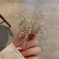 Women's butterfly-shaped alloy hair clip in rhinestone or pearl style, measuring 6.7 cm.